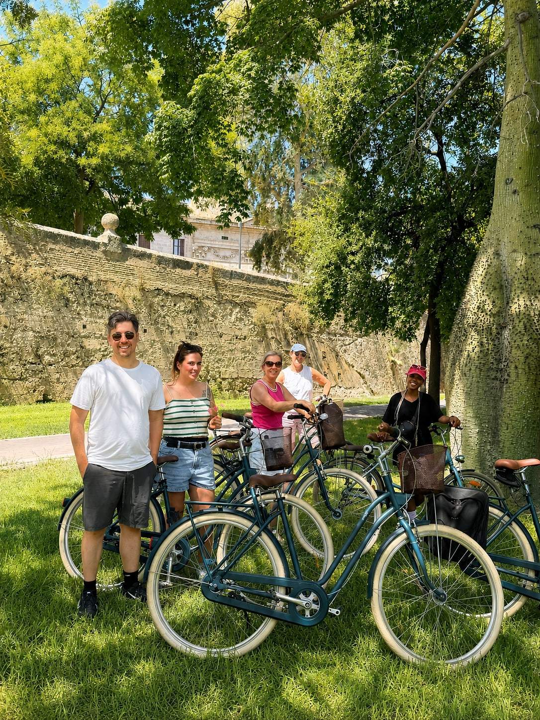 Cyclists gather on the tour route through Valencia