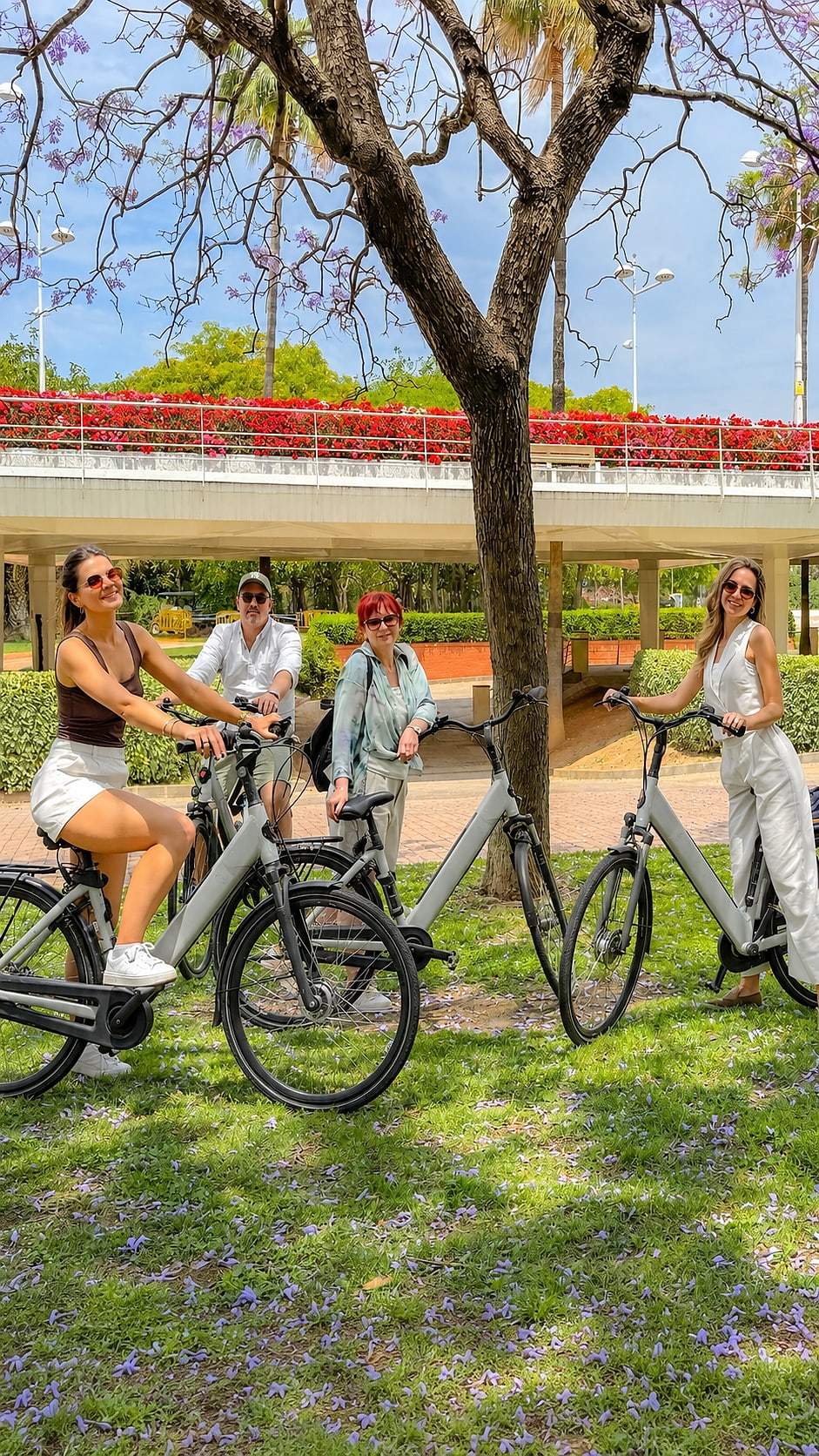 Guests stop for a photo during the daily bike tour