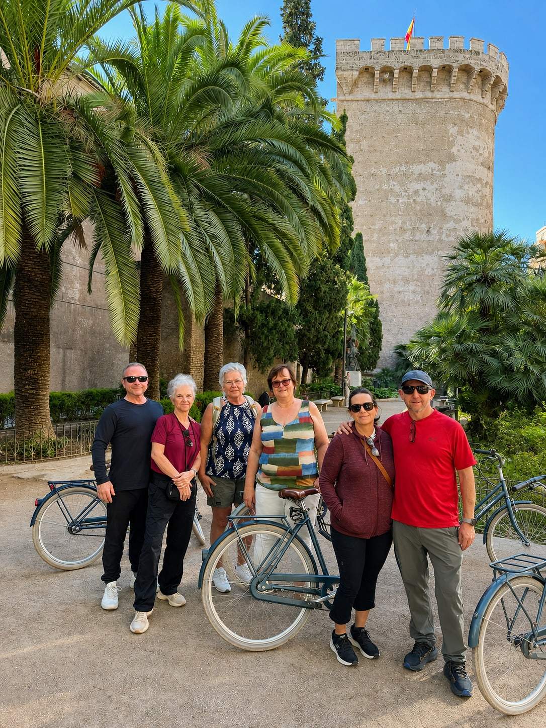 Guests stop for a photo during the daily bike tour