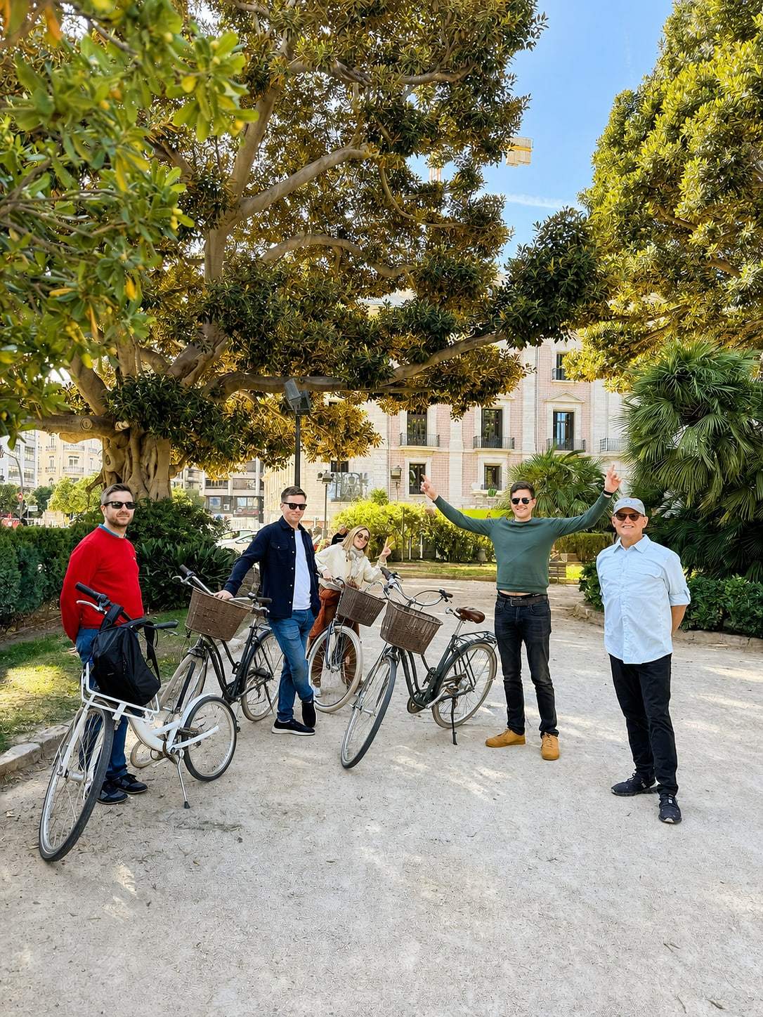 Cyclists gather on the tour route through Valencia