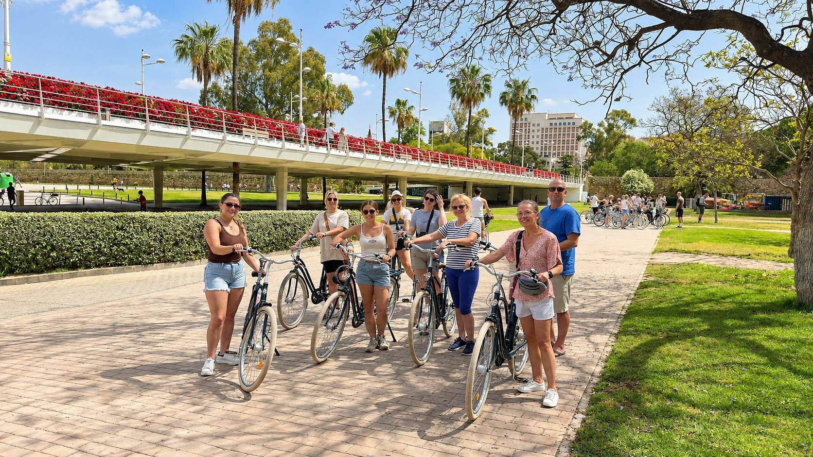 Cyclists gather on the tour route through Valencia