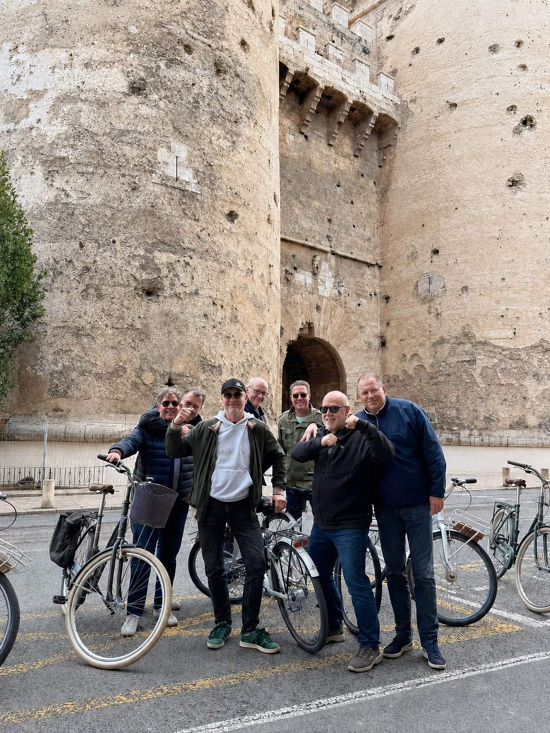 Cyclists gather on the tour route through Valencia
